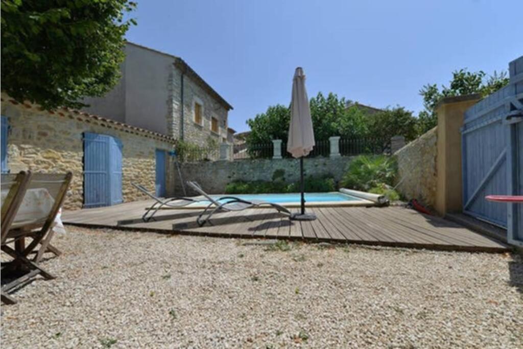 Maison de plain pied pour 4 pers piscine Lussan Lussan  Extérieur photo